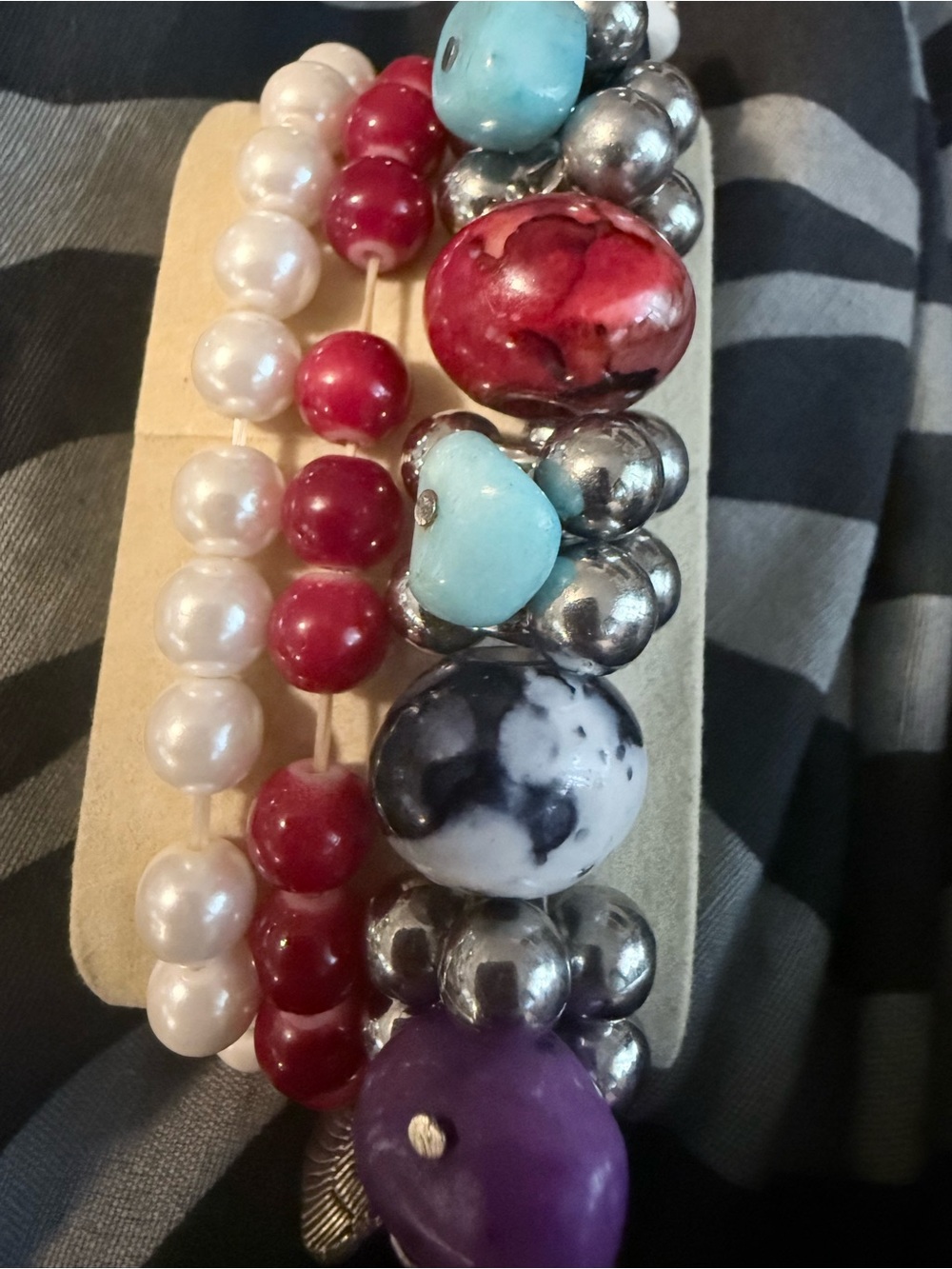 faux pearls, red beaded strands, and larger decorative stones set of 3 bracelets